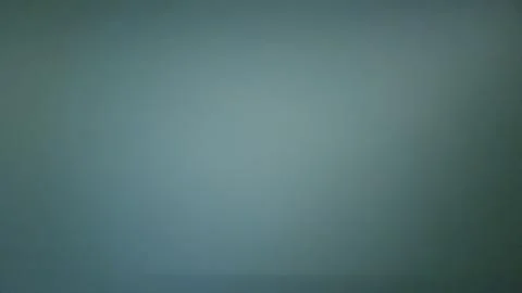 Dark green smooth wall texture with subtle lighting gradient Stock Photos