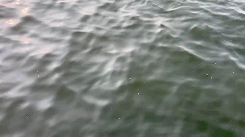 Dark Green Water Waves Surface Motion with Natural Sun Refraction Light Pattern Stock Footage 343140871