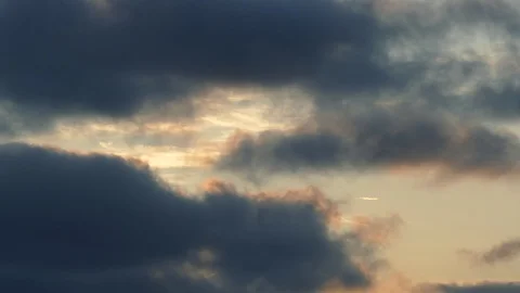 Dark grey and golden clouds at sunrise - 4k Time Lapse Video 스톡 동영상 107870132