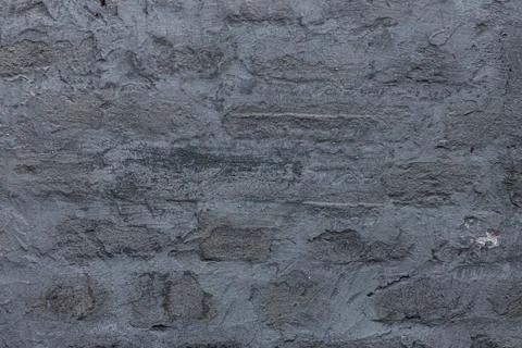 Dark grey brick wall texture. Old retro building background copy space. Black Foto stock