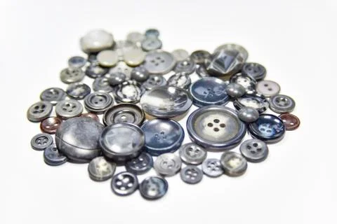 Dark grey buttons of different shape and size on the white background. Select Stock Photos