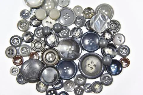 Dark grey buttons of different shape and size on the white background. Select Stock Photos