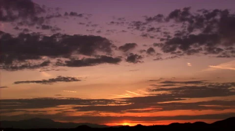 Dark grey cirrus stratus clouds on purplesky. Video stock 281850257