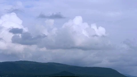  Dark grey clouds on the blue sky background. Stock Footage 118499635