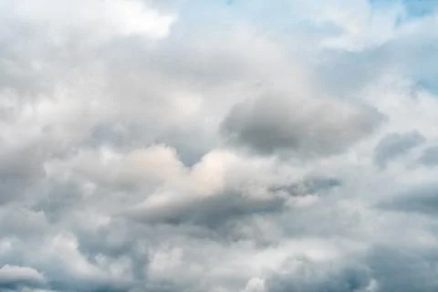 Dark grey clouds covered sky before rain. Stock Photos