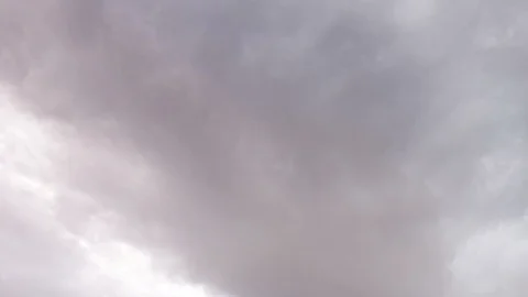 Dark grey clouds move across the sky. Stormy weather. Stock Footage 87327344