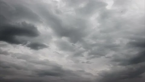 Dark grey clouds movement at gloomy day time lapse Stock Footage 131334981