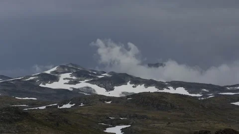 Dark grey clouds over peak on Sognefjell,4k,timelapse Stock Footage 230216794