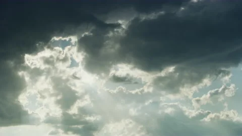 Dark Grey Clouds Pass to Make Way for the Glorious Sunshine Stock Footage 154956757