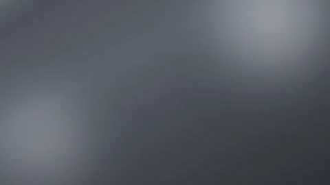 Dark grey gradient background with soft light flares. 4K Video stock 342781760