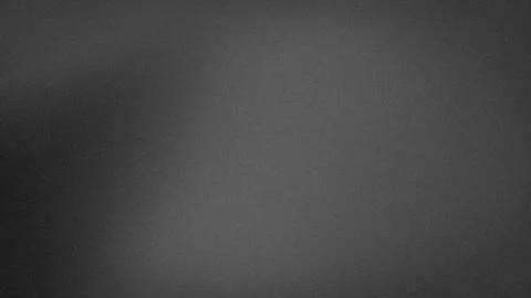 Dark grey gradient grunge texture background with grainy blur effect 4K dig.. Stock Photos