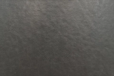 Dark grey leather texture as backdrop Stock Photos
