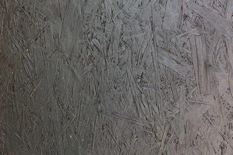 Dark grey painted OSB surface background and texture Stock Photos
