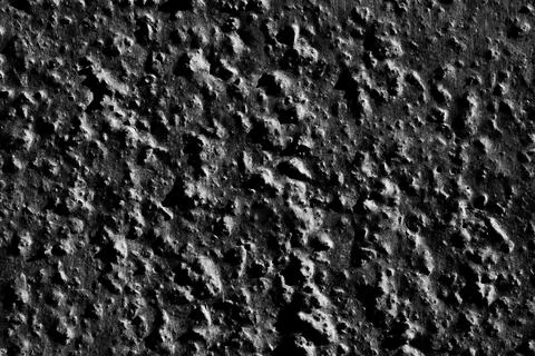 Dark grey rough stone wall texture background Stock Photos