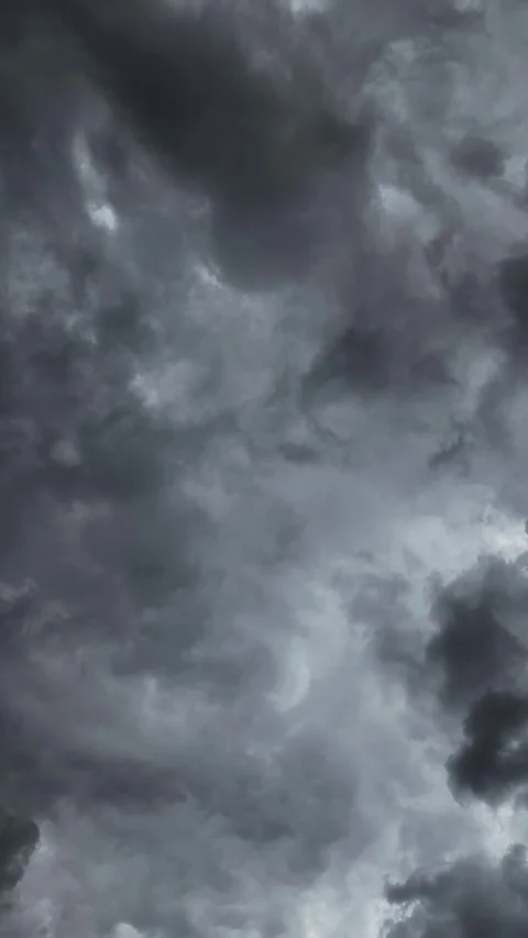 Dark grey storm cloud formations passing overhead TIMELAPSE Video stock 315631661