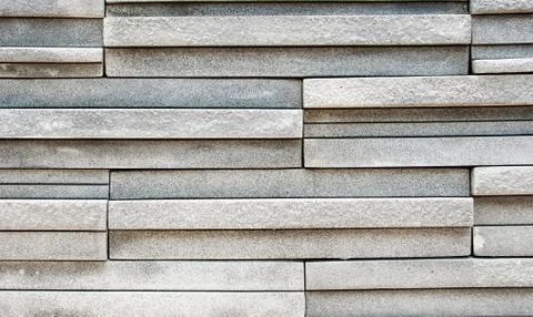 Dark grey tile texture brick wall surfaced Stock Photos