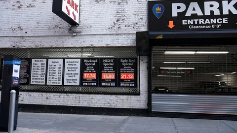 Dark Gritty NYC Parking Lot Entrance Driving Profile Shot Evening Stock Footage 127328897