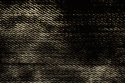 Dark grunge background of golden texture Stock Photos