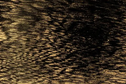 Dark grunge texture with abstract pattern on a brown old chopping board Stock Photos