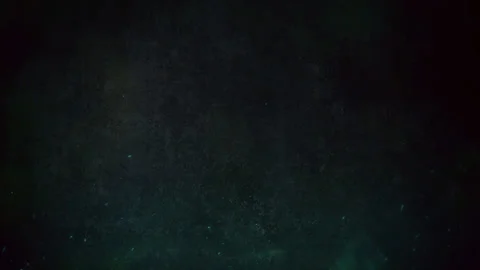 Dark Grunge Texture Background Teal Green Glowing Dust Particles Cinematic Stock Footage 340371182