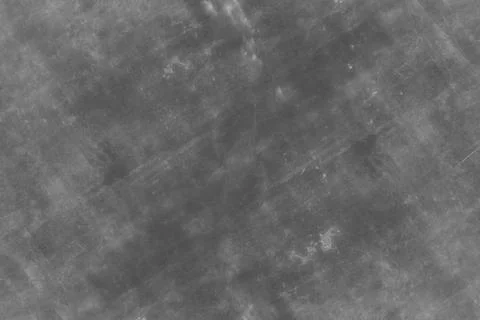 Dark grunge texture with scratched surface and industrial pattern. Stock Photos