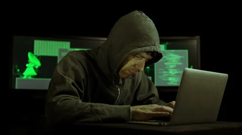 Dark Hacker with hoodie cracking code (HD) Stock Footage 38042134