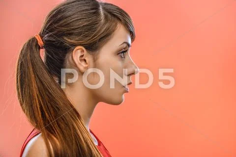 Dark-haired calm woman in profile Stock Photos
