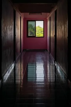 Dark Hallway With Window Light Stock-Fotos