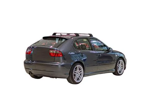 Dark hatchback car isolated on white background, showcasing sleek profile, .. Stock Photos