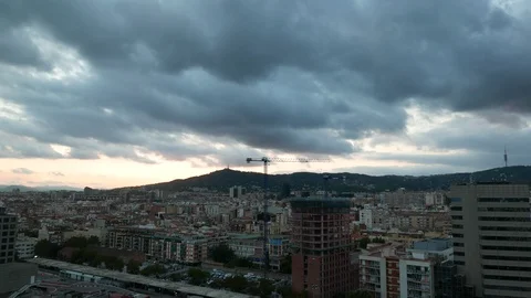 Dark heavy clouds over Barcelona city Stock Footage 99535179
