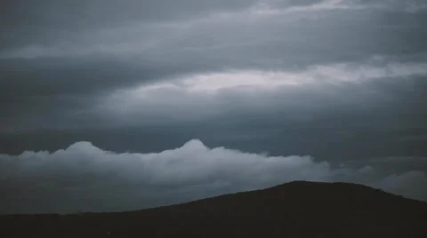 Dark hill and clouds Stock Footage 66786156