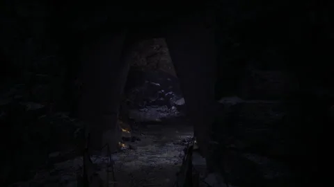 Dark hollow camp radiates warmth amidst quiet planning activities Stock Footage 339799123