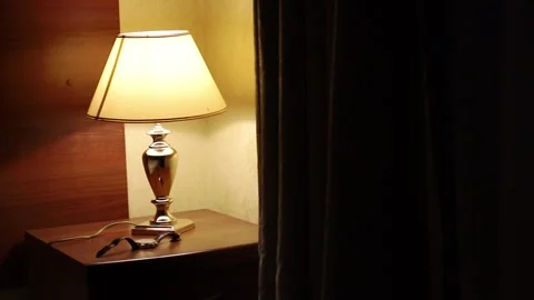 Dark Hotel Room Lit By Table Shade Lamp Stock Footage 312234323