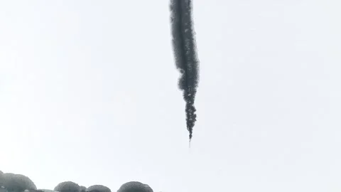 Dark ice formation rises from the frozen surface, with a contrasting icy edge Stock Footage 341120910