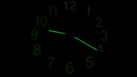 Dark illuminated fluorescent clock timelapse,time pass concept,clock motion Stock Footage 126442540
