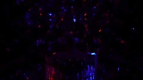Dark immersive pavilion with glowing blue and red geometric crystals. Stock Footage 315902515