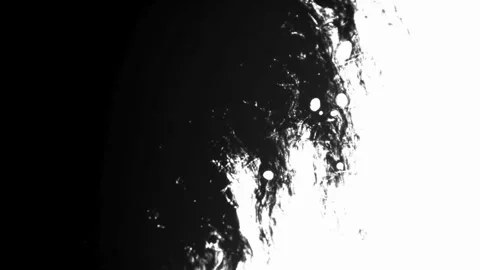 Dark ink bleeds from the top left corner corner Stock Footage 329667551