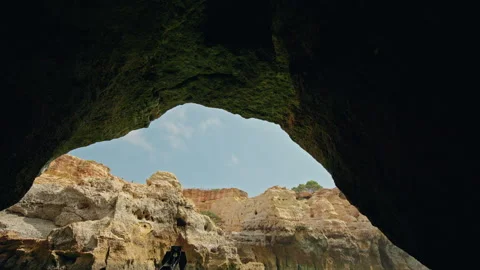 Dark interior of Devils Eyes Cave on the Algarve coast. Stock Footage 340921886