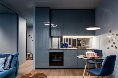 Dark interior with open kitchen Stock Photos