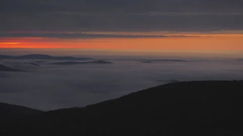 Dark inversion clouds at sunrise morning panning Blue ridge Video stock 160210104