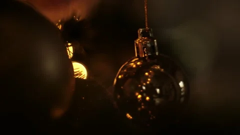 Dark key, Christmas tree background with golden ball Stock Footage 256960458