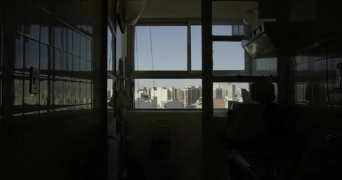 Dark Kitchen Interior with Buenos Aires Skyline and Moving Cables Stock Footage 320563665