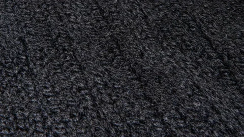 Dark knitted woolen flat moves slowly. animated three-dimensional background. 3d Stock Footage 139894639