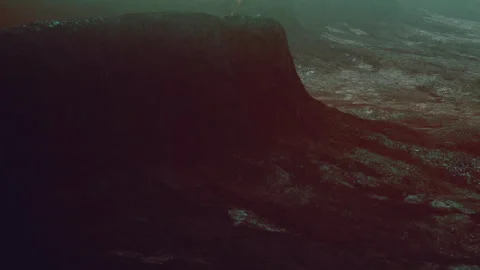 Dark landscape on an alien planet with strange rock formations at dawn Stock Footage 344863343