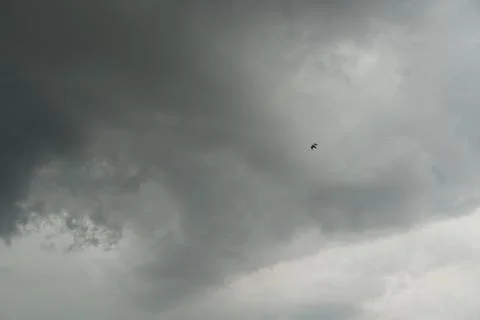 Dark layers cloudy rain coming. Dark storm clouds background. Dark sky full o Stock Photos