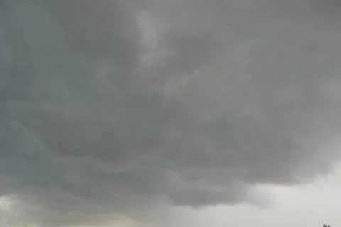 Dark layers cloudy rain coming. Dark storm clouds background. Dark sky full o Stock Photos