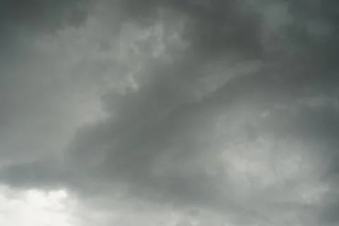 Dark layers cloudy rain coming. Dark storm clouds background. Dark sky full o Stock Photos