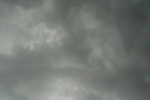 Dark layers cloudy rain coming. Dark storm clouds background. Dark sky full o Stock Photos