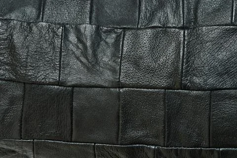 Dark leather square patch material Stock Photos