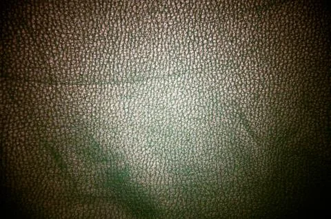 Dark leather texture closeup to use as background Stock Photos